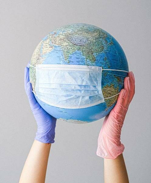 Planeta tierra con cubrebocas